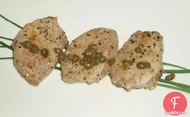 Medalioane de porc cu lămâie și capere