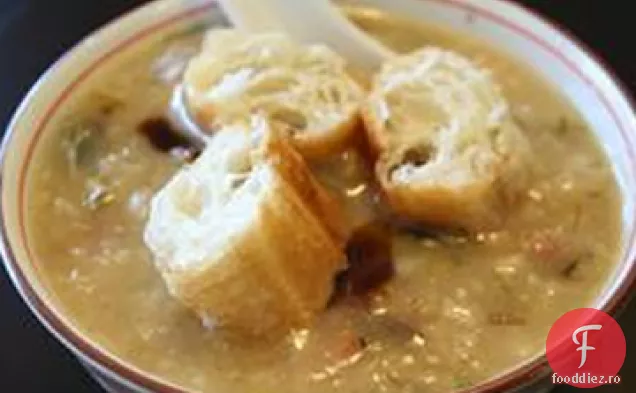 Carne de porc și secol ou orez Congee