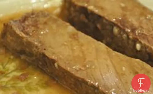 Friptură de flanc fiert cu lămâie și usturoi