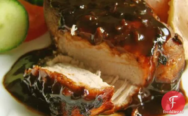 Cotlet de porc la cuptor în sos de ceapă-smântână
