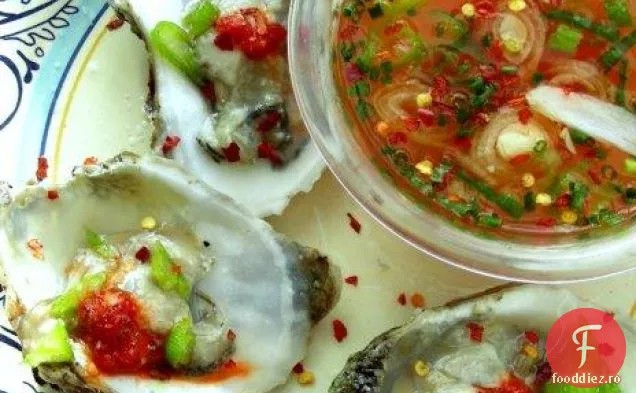 Stridii proaspăt Shucked și sos Mignonette cu o poftă de mâncare!