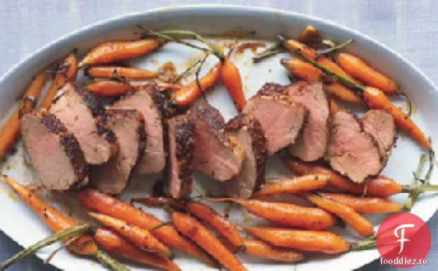 Filet de porc frecat cu condimente cu morcovi prăjiți