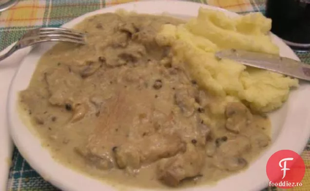 Cotlet de porc Nord-croat în sos de ciuperci