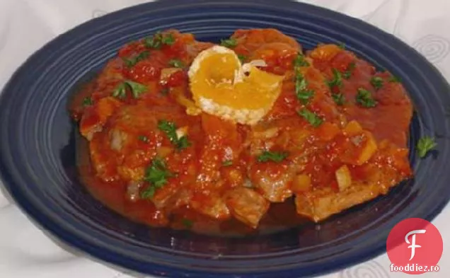 Cotlet de porc în sos de portocale-caise