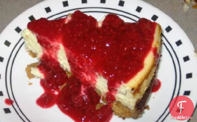 Cheesecake Delicios Cu Lămâie Cu Sos De Zmeură