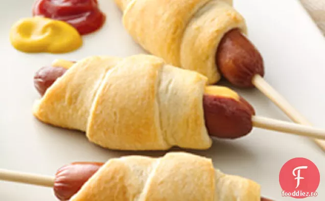 Crescent câine pe un băț