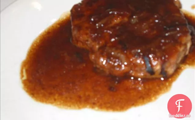 Cotlet de porc în sos de ceapă