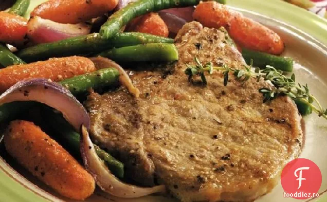 Cotlete și legume de porc prăjite la cuptor