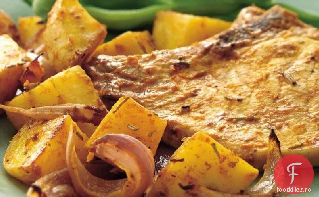 Cotlet de porc cu rozmarin prăjit și cartofi