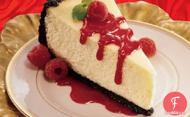 Cheesecake portocaliu cu sos de zmeură