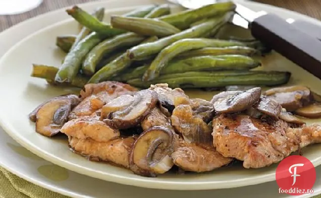 Carne de porc cu sos de ciuperci