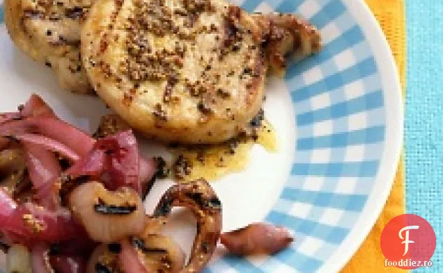 Cotlet de porc și ceapă acoperite cu muștar