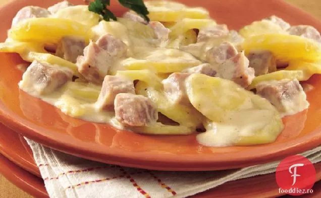 Cartofi cu brânză festonată cu șuncă