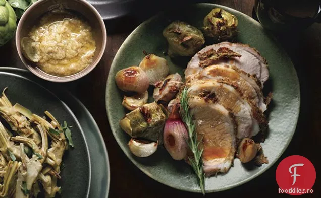 Cotlet de porc de rozmarin și muștar cu anghinare, șalotă și vermut Jus