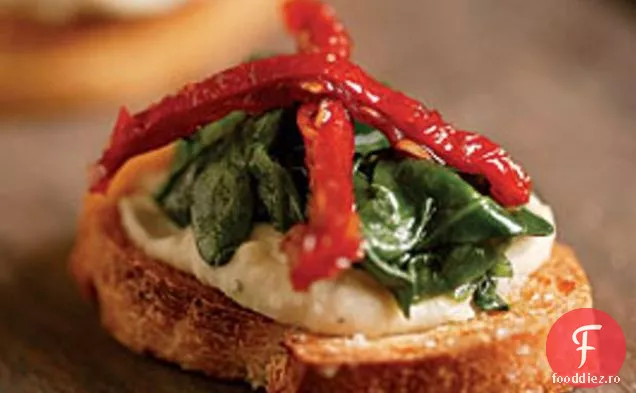 Crostini cu fasole albă pur și simplu, spanac și roșii uscate la soare