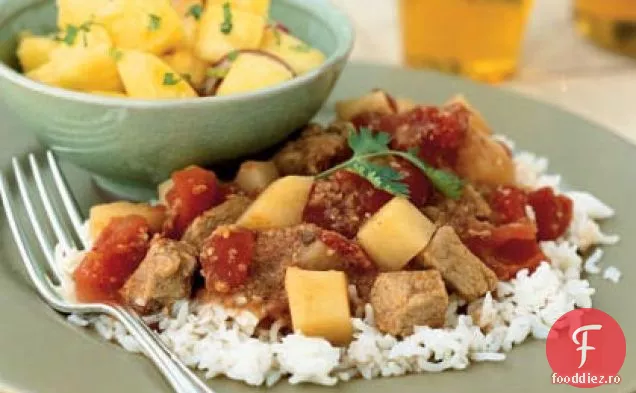Carne de porc condimentată Indian în sos de roșii