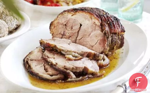 Carne de porc prăjită lent cu mere și ardei