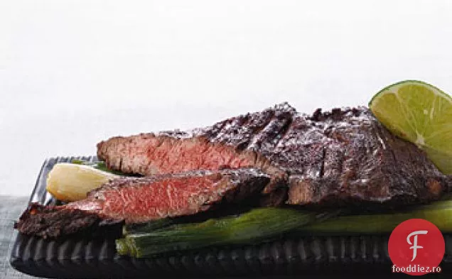 Friptură de fustă sotată cu Scallions fierte