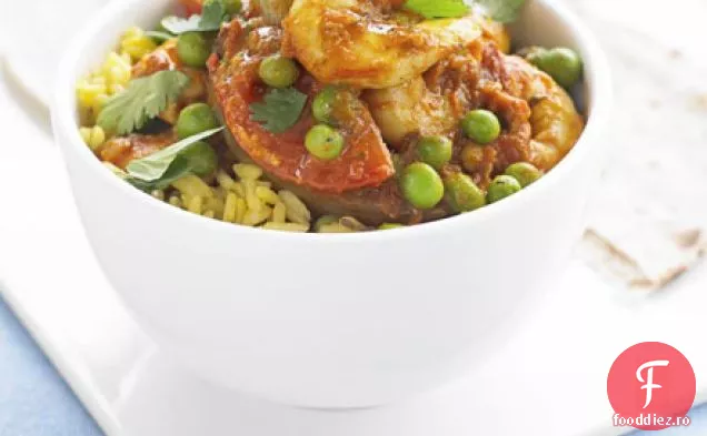 Curry de creveți, mazăre și roșii