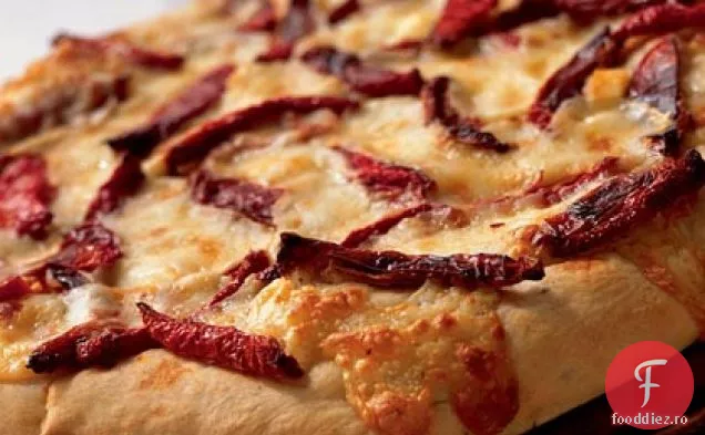 Pâine plată cu roșii uscate la cuptor, rozmarin și Fontina