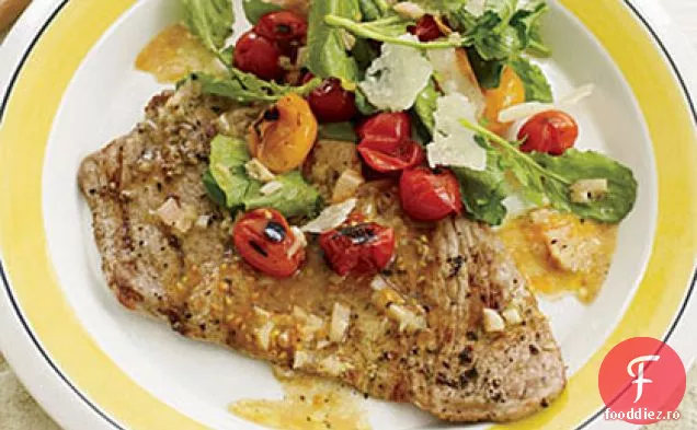 Scallopine de vițel cu salată de roșii cherry carbonizate