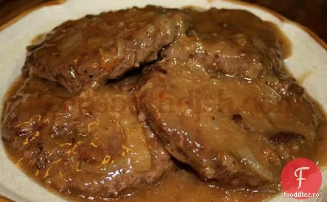 Friptură de Hamburger cu sos cremos de ceapă