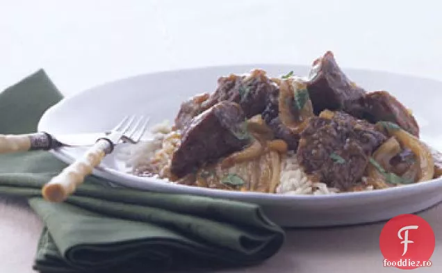 Carne de porc fiartă cu portocală și fenicul