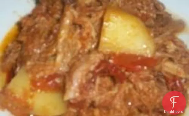 Carne de porc Chile Rojo (carne de porc tras cu sos roșu Chile)