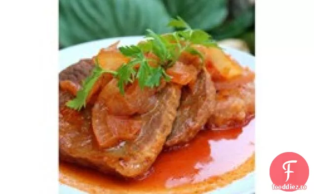 Ochi de friptură rotundă și Ketchup