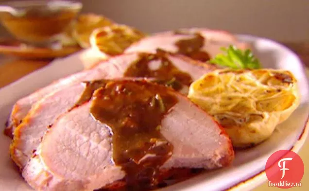 Carne de porc prăjită cu vinetă de usturoi prăjită