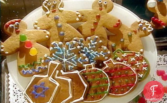 Proiecte cookie de vacanță pentru oameni de turtă dulce: fulgi de zăpadă albi, triouri Dreidel și ornamente