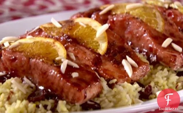 Somon glazurat cu orez șofran de cireș uscat