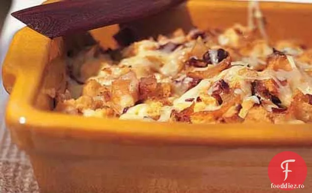 Straturi de ceapă aurie cu Gruy Otrivre și Prosciutto