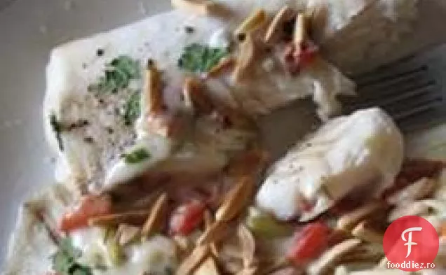 Halibut cu usturoi cremos și sos de ierburi