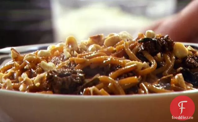 Risotto de spaghete sparte cu ciuperci sălbatice cu rucola și alune