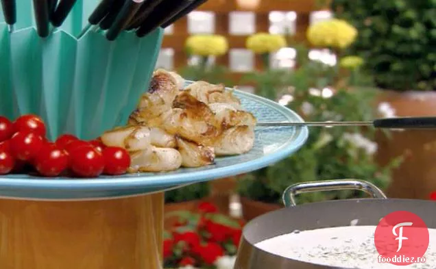 Fondue de brânză albastră cu roșii Cherry și ceapă Cipollini prăjită