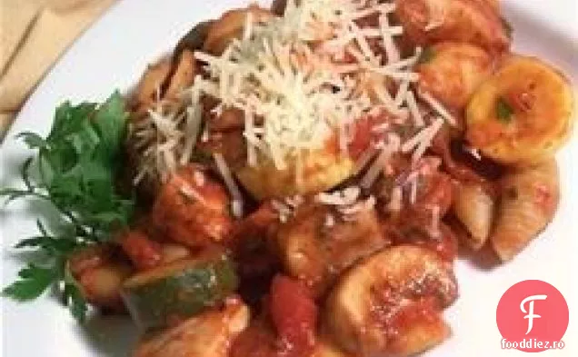 Carne de porc și scoici de mare cu legume de vară