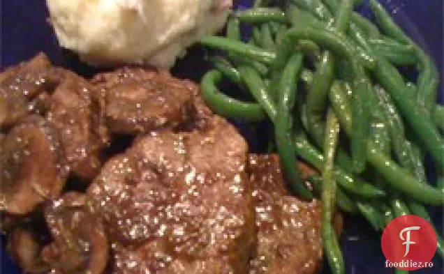 Filete prăjite cu sos de ciuperci