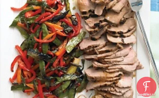 Carne de porc friptă cu soia cu orez și legume asiatice