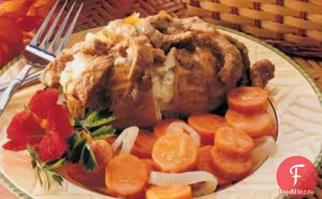 Friptură peste cartofi