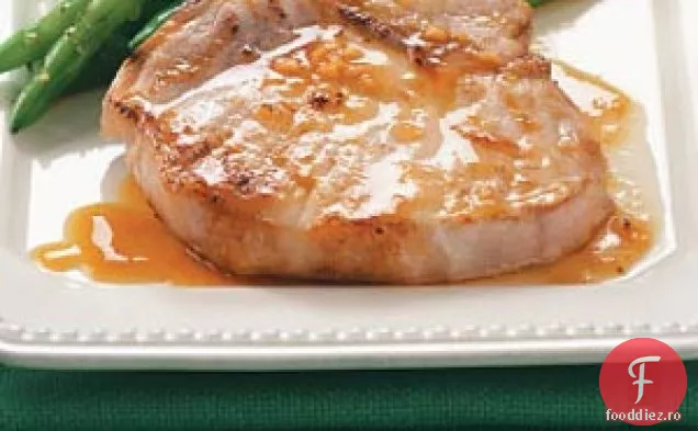 Cotlet de porc cu sos de portocale pentru doi
