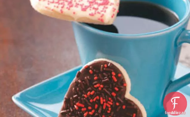 Biscuiți cu inimă glazurată cu ciocolată