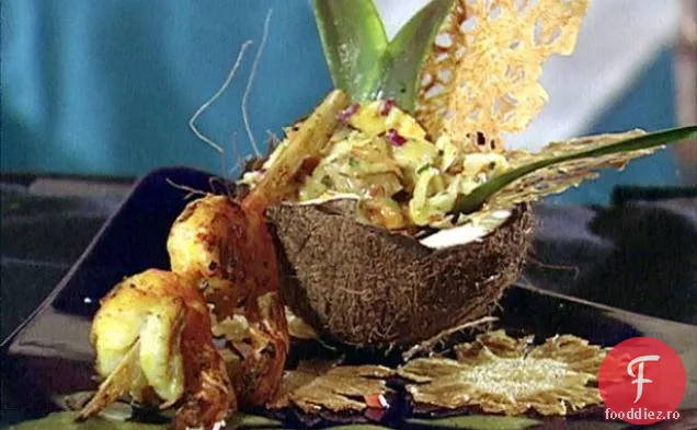 Pâine de zahăr glazurată, salată de ananas și homar, ornata cu nucă de cocos prăjită și creveți la grătar cu citrice în stil cubanez
