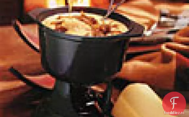 Fondue gruyincromroyre cu șalotă caramelizată