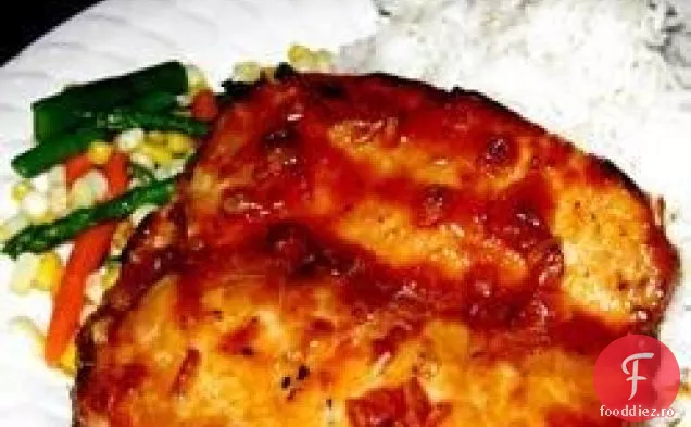 Mușchiuleț de porc glazurat cu portocale și condimente italienești