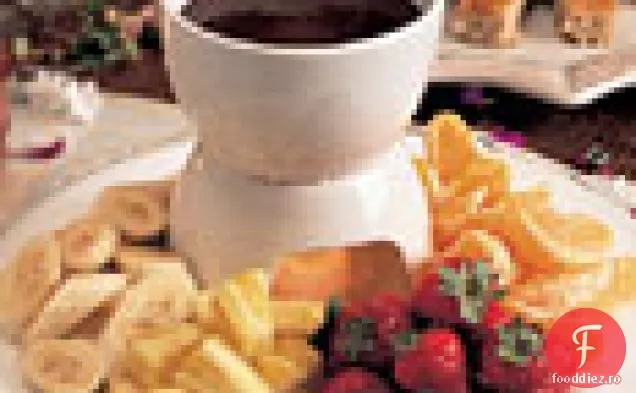Fondue cu cremă de ciocolată și nucă de cocos