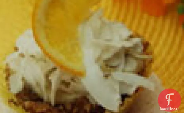 Cupcakes De Nucă De Cocos Umplute Cu Budincă De Lămâie Cu Topping De Nucă De Cocos Ras