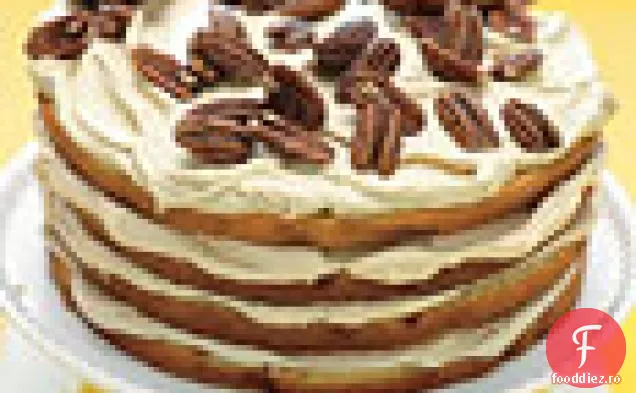 Tort cu strat de banane cu cremă de Caramel și nuci pecan