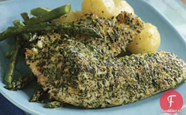 Tilapia acoperită cu ierburi cu lămâie