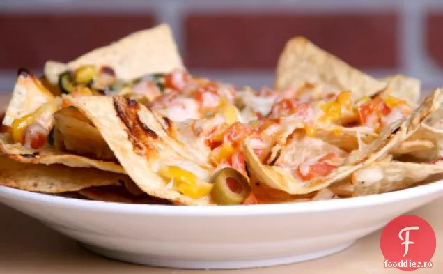 Rocco a încărcat nachos cu curcan, fasole neagră și Salsa